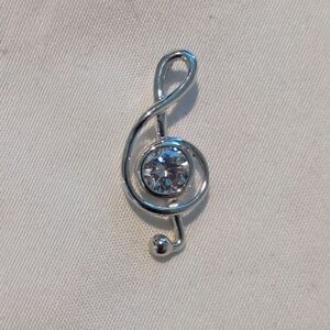 Elegant Silver Treble Clef Pendant